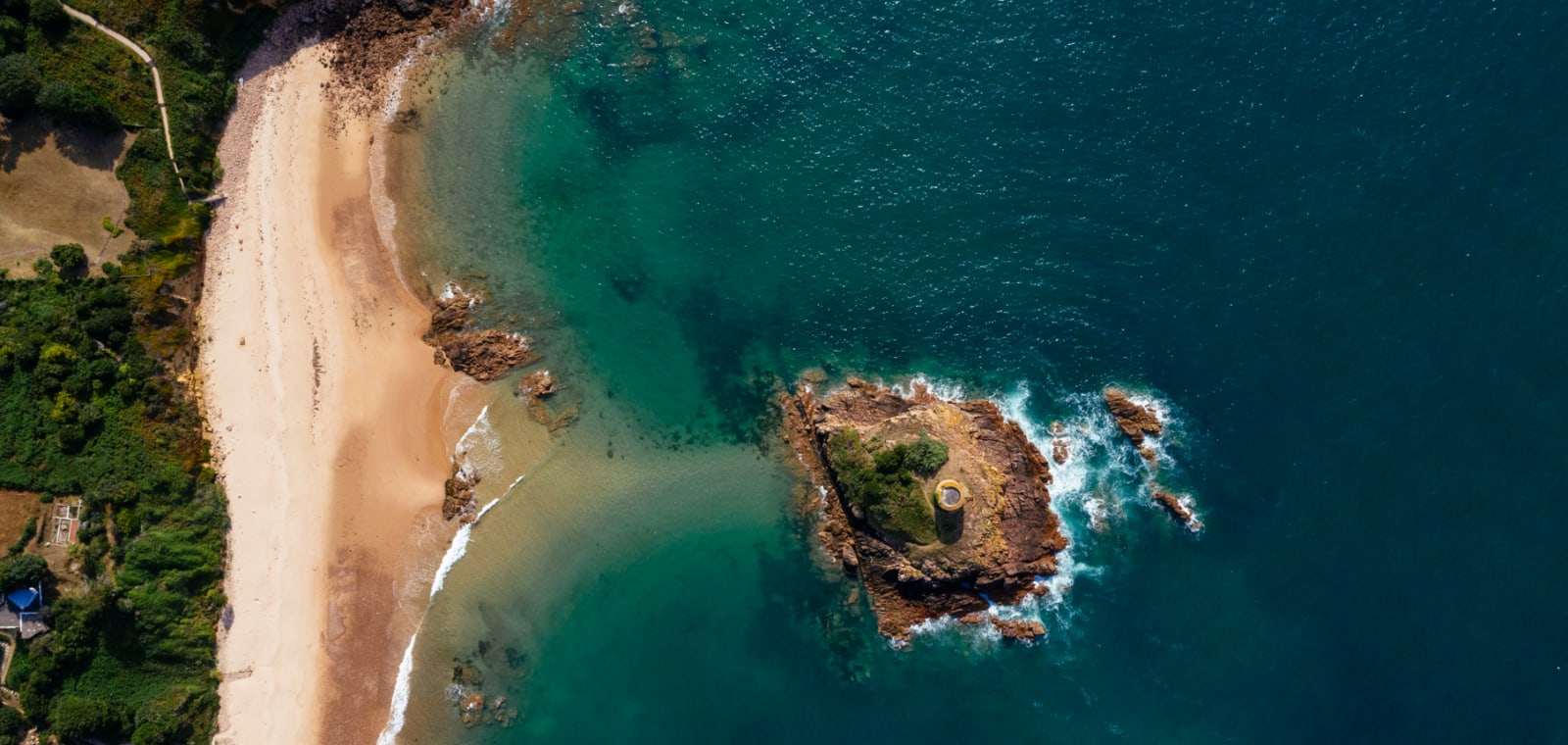 Portelet Bay showcasing its white sand beaches and clear blue water. Credit: James Bowden/Blue Marine Foundation