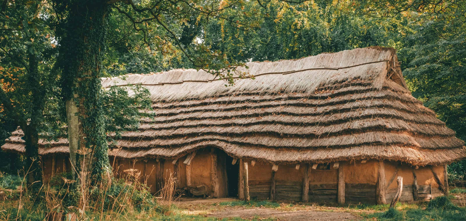 Longhouse Tour and Fire Lighting at La Hougue Bie