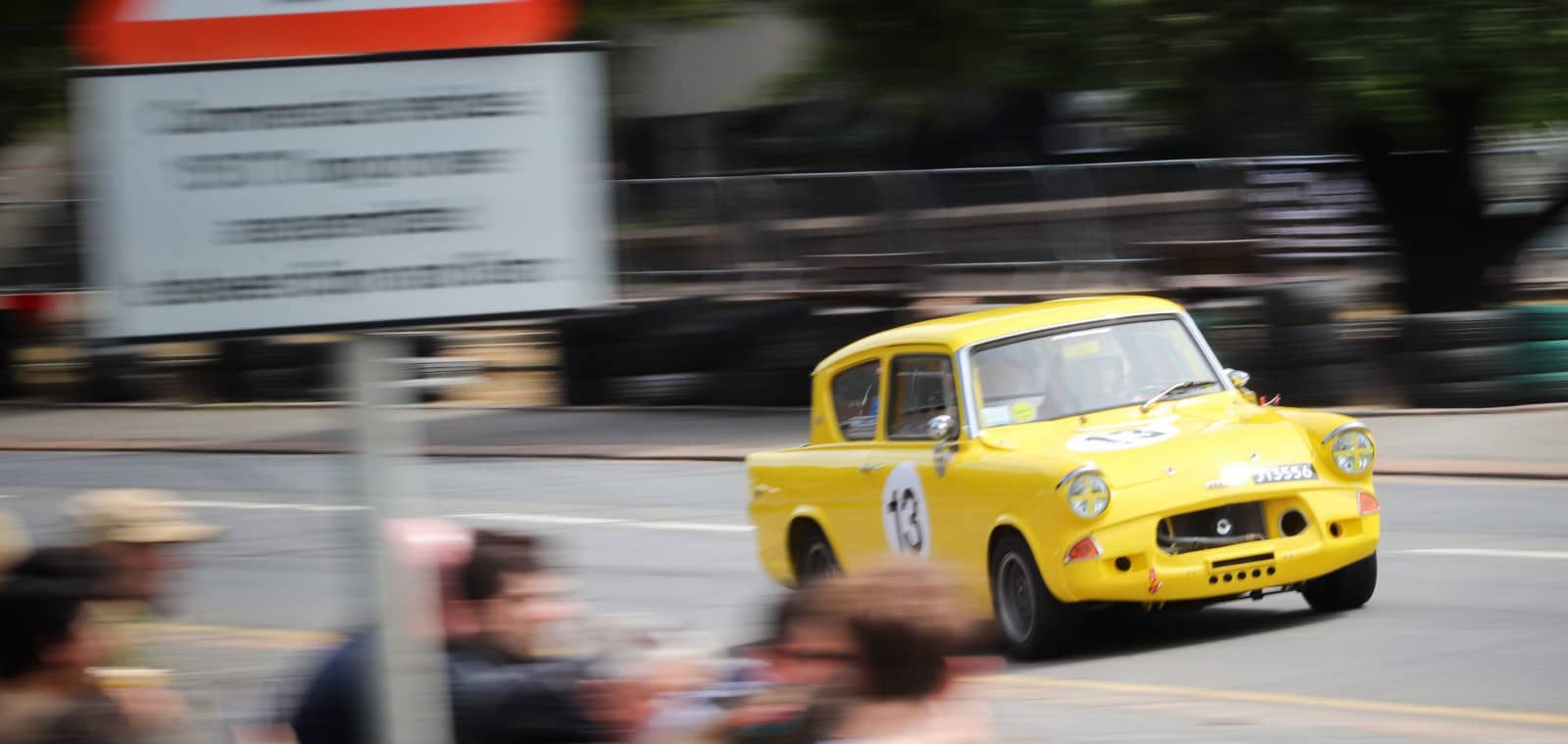 Ford Anglia racecar demonstrating in front of the fans