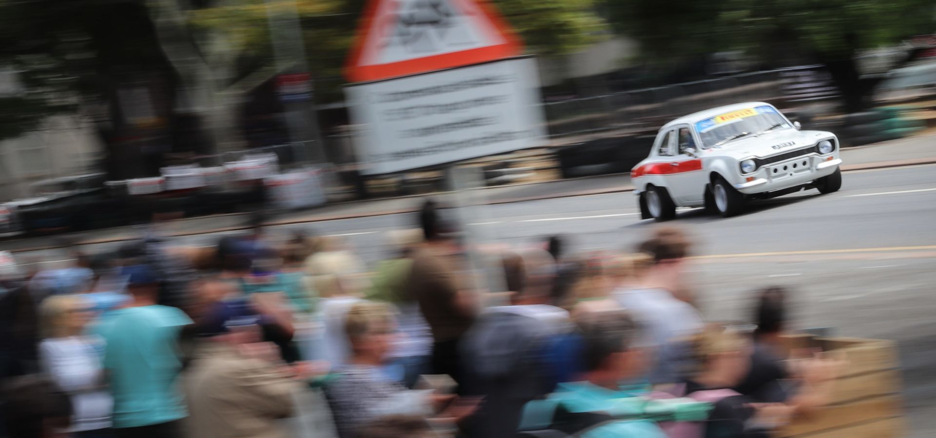 A Mk1 Ford Escort wowing the crowds on the active arena around Victoria Park, Jersey