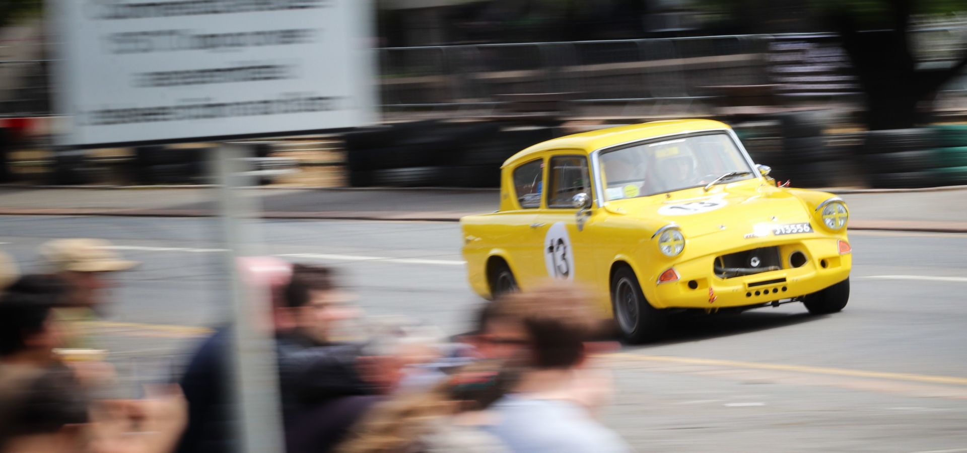 Ford Anglia racecar demonstrating in front of the fans