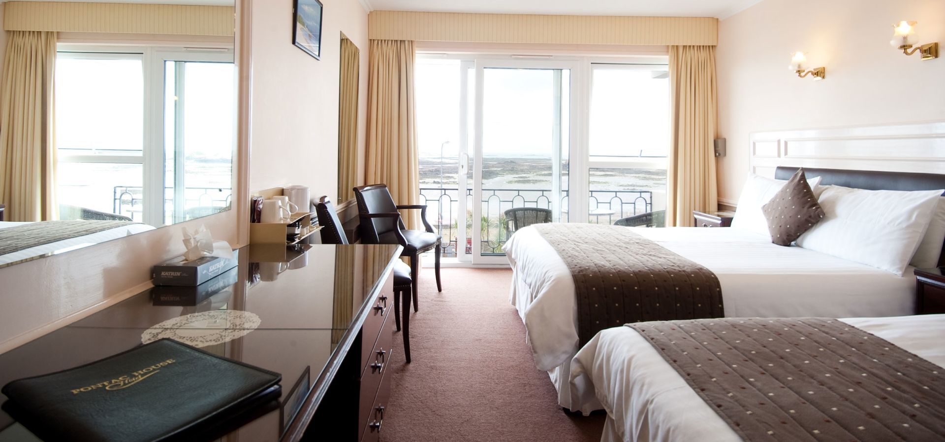 Large bedroom with balcony overlooking St. Clement