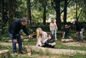 La Hougue Bie Family group with volunteer learn ancient crafts