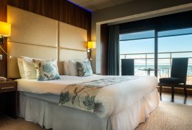 King bedroom with spectacular views over the bay