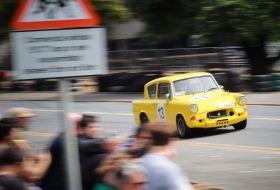 Ford Anglia racecar demonstrating in front of the fans