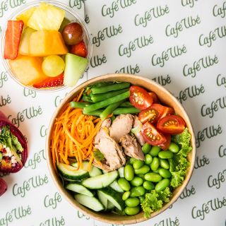 Beetroot wrap, salad, and fruit pot