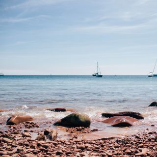 Two boats moored off Beauport Bay Jersey