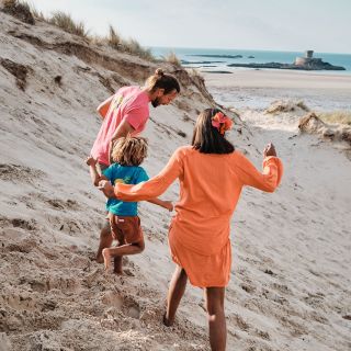 Family Playing at the sand dunes in St. Ouens Bay