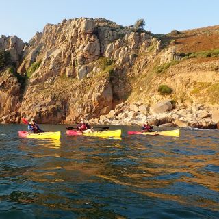 sunset kayaking at Ouaisne bay