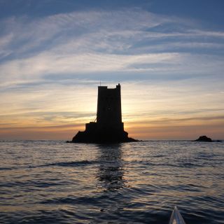 Sunset at Seymour tower. Kayak tours