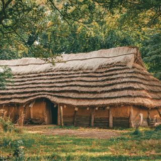 The replica neolithic longhouse at La Hougue Bie