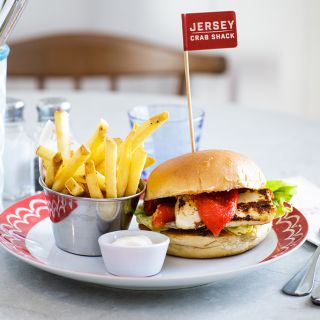 Halloumi burger with fries and Jersey Crab Shack decoration