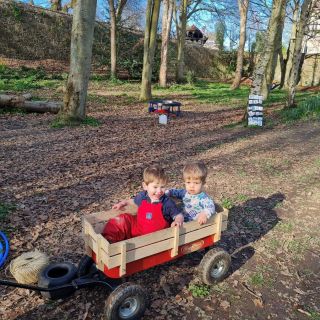 Children playing in wagons