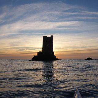 Sunset at Seymour tower. Kayak tours