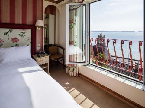 Bedroom with large folding windows