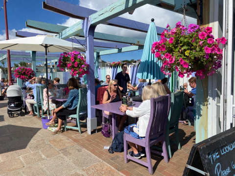Alfresco seating overlooking St Aubins Bay