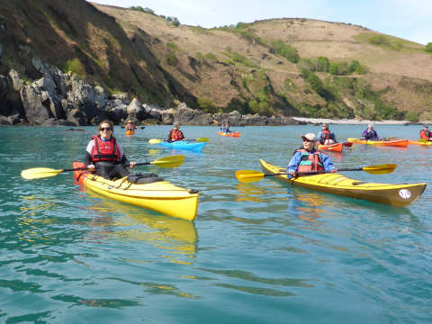 Sit inside and sit on top sea kayaks at Bonne Nuit bay