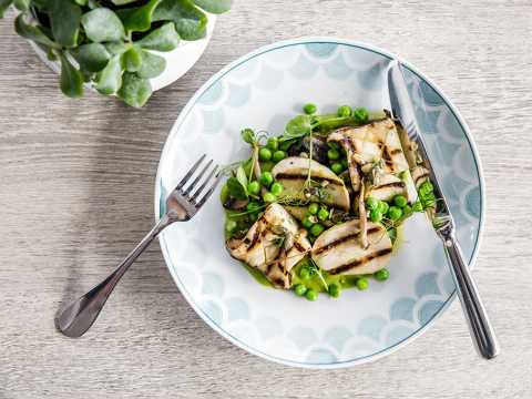 An Oyster Box plate, with vegan mushrooms and pea puree