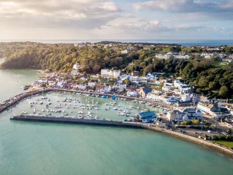 Aerial view of St. Aubin's Harbour as the sun shines down