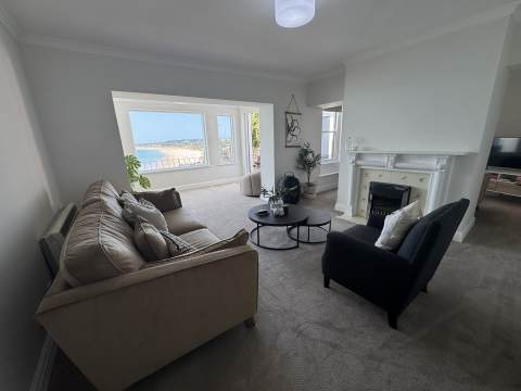 Spacious Lounge with views over the bay of Grouville