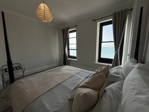 Bedroom with views and ensuite bathroom