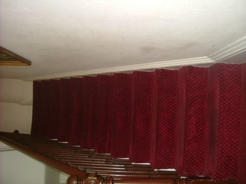 Stairs from reception to first floor