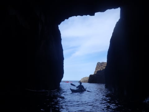 Exploring one of the north coast sea caves