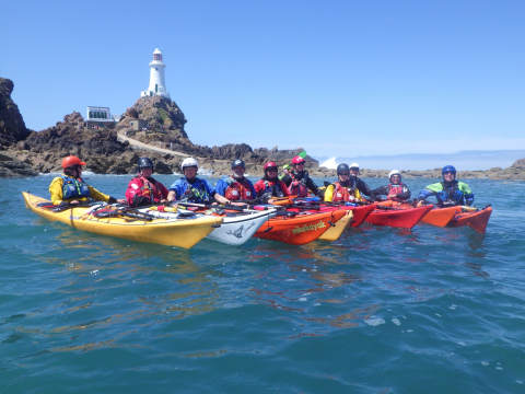 Sea kayakers at Corbiere lighthouse