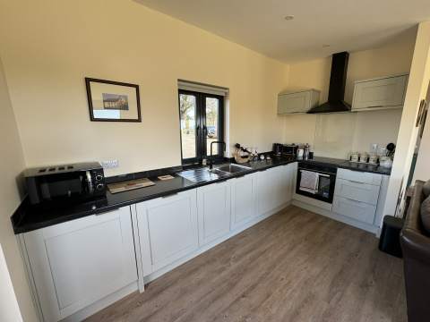 Open plan kitchen, lounge and dining