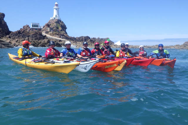 Sea kayakers at Corbiere lighthouse
