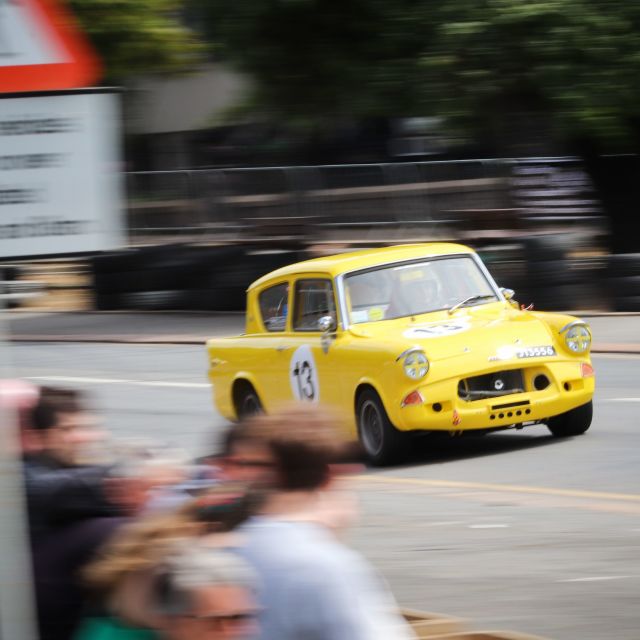 Ford Anglia racecar demonstrating in front of the fans