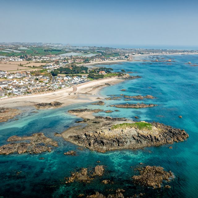 Green Island from overhead with tropical waters below