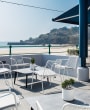 Chairs and tables overlooking the beach