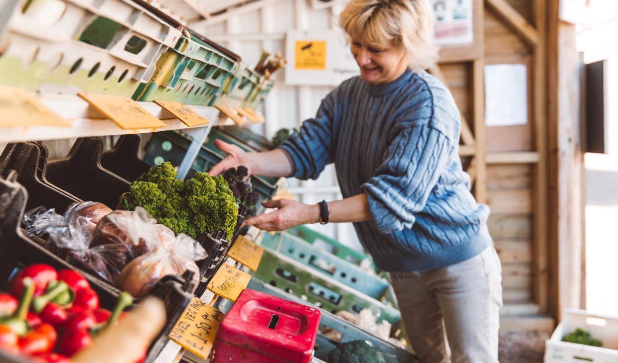 Christine Helio working at her farm stall