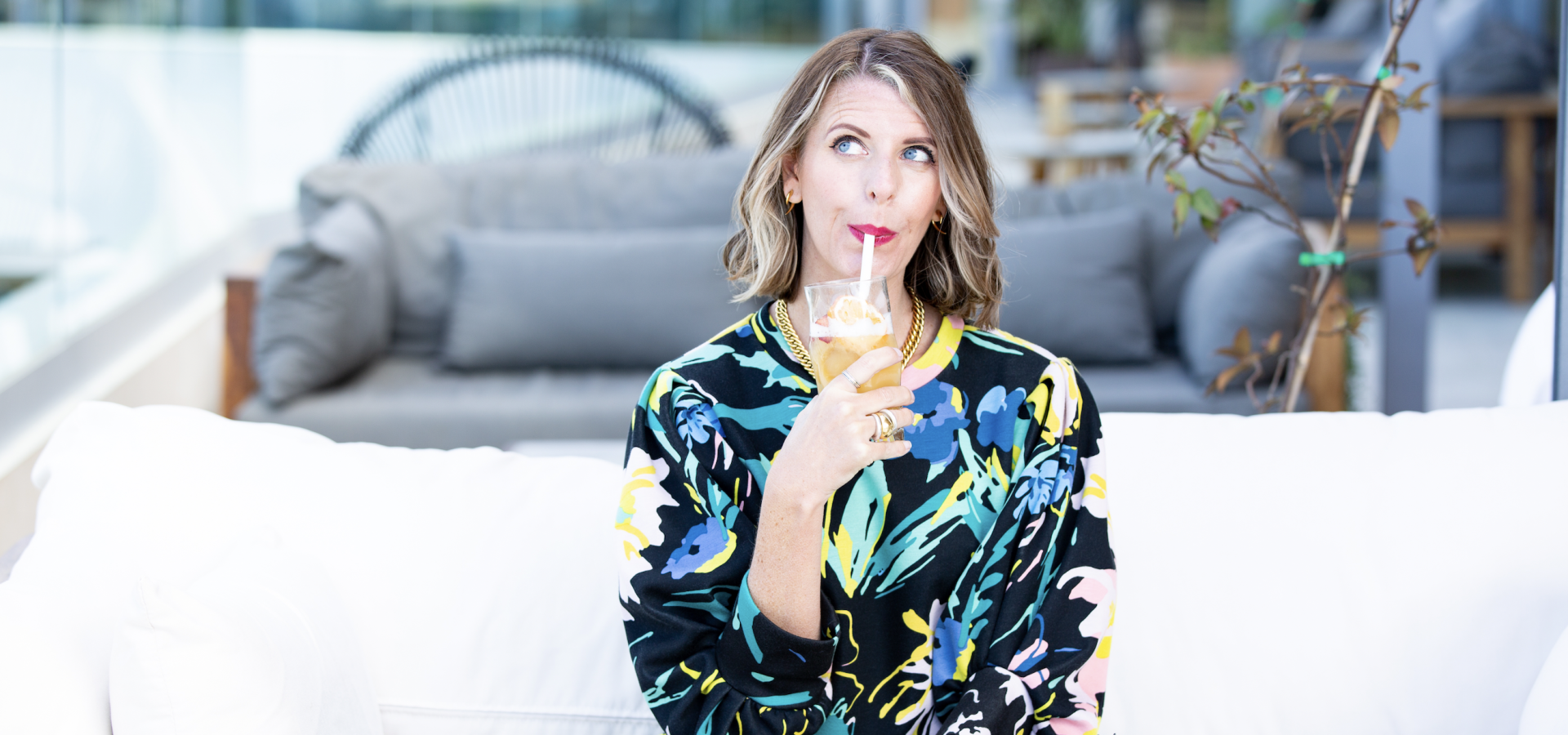 Woman sipping a mocktail