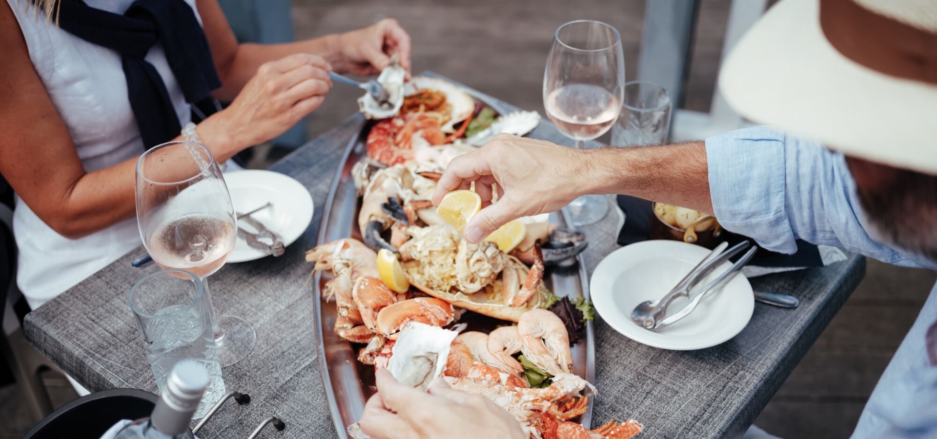Couple eating a seafood platter