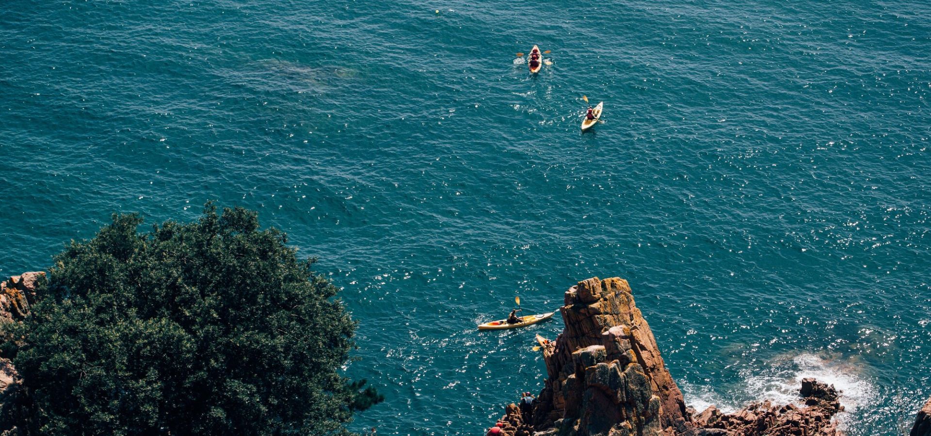 Kayakers in the sea around Beauport