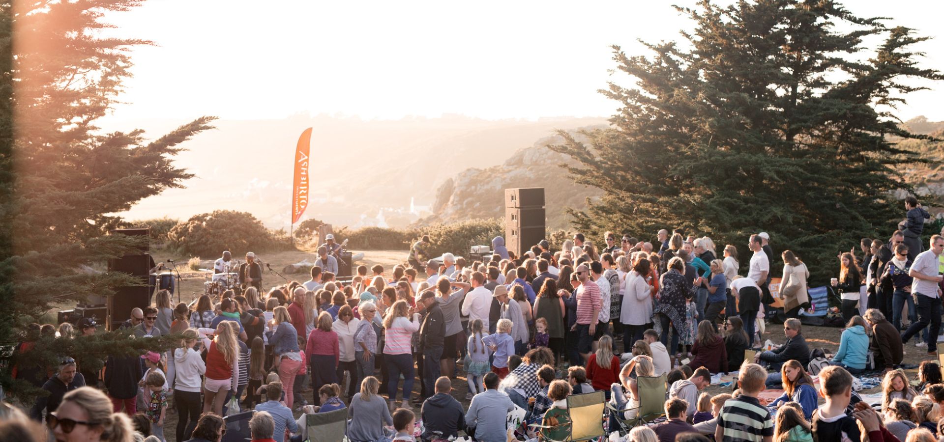 A crowd enjoying the Sunset Concert at Grantez Jersey