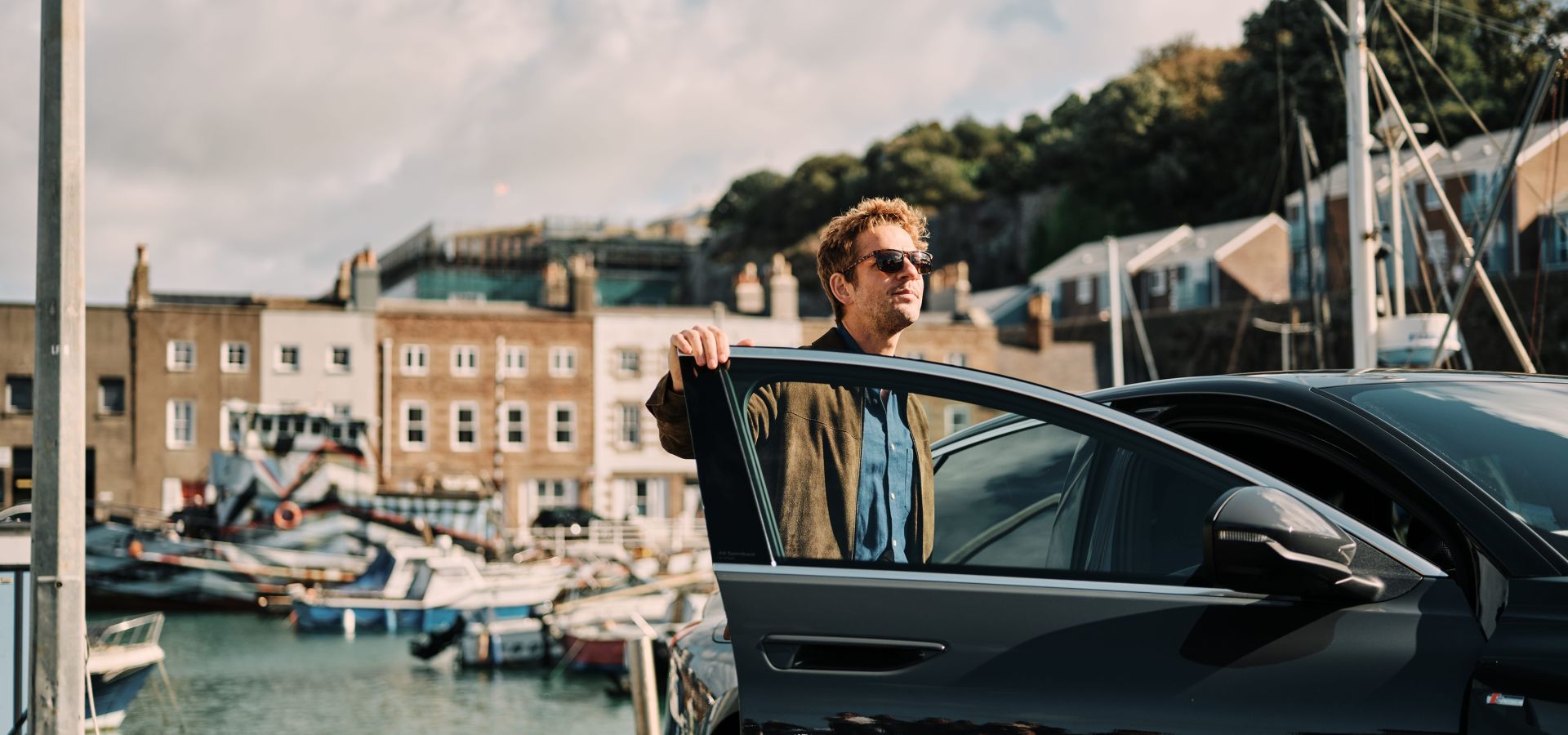 Damien Maloney exiting at car in St. Helier Harbour