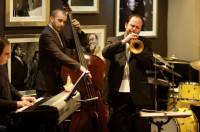 A trumpeteer playing inside a jazz bar in Jersey