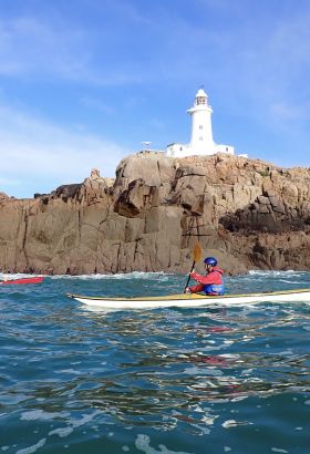 Kayaker at Corbiere lighthouse