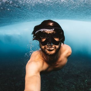 Underwater photo of a man snorkelling