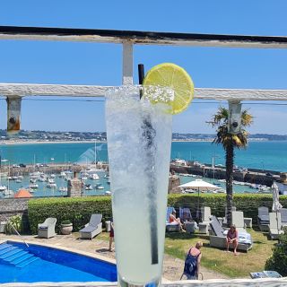 Cocktail with sea in the background