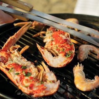Prawns cooking on a barbecue