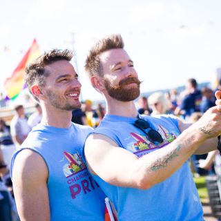 Two people celebrating pride.