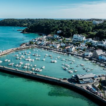 Aerial view of the blue sea and coastline of St. Aubin