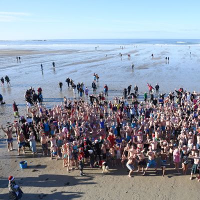 A crowd of people on St Ouen