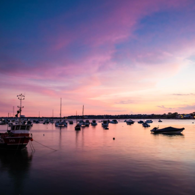 Pink sunset overlooking a harbour