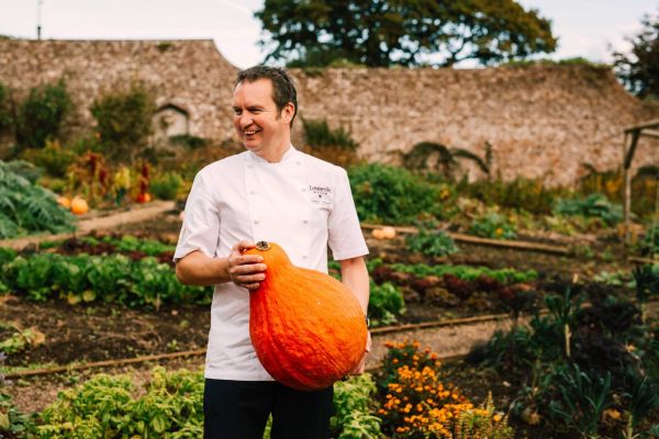 Man with pumpkin