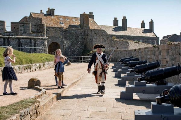 Kids with a soldier at Elizabeth castle castle